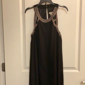 Easy black dress with bohemian style trim